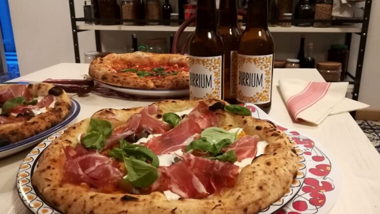 Dove si trova il Cuor di Pizza a Roma e cosa offre il menu 17 pizza fumante su un tavolo romano